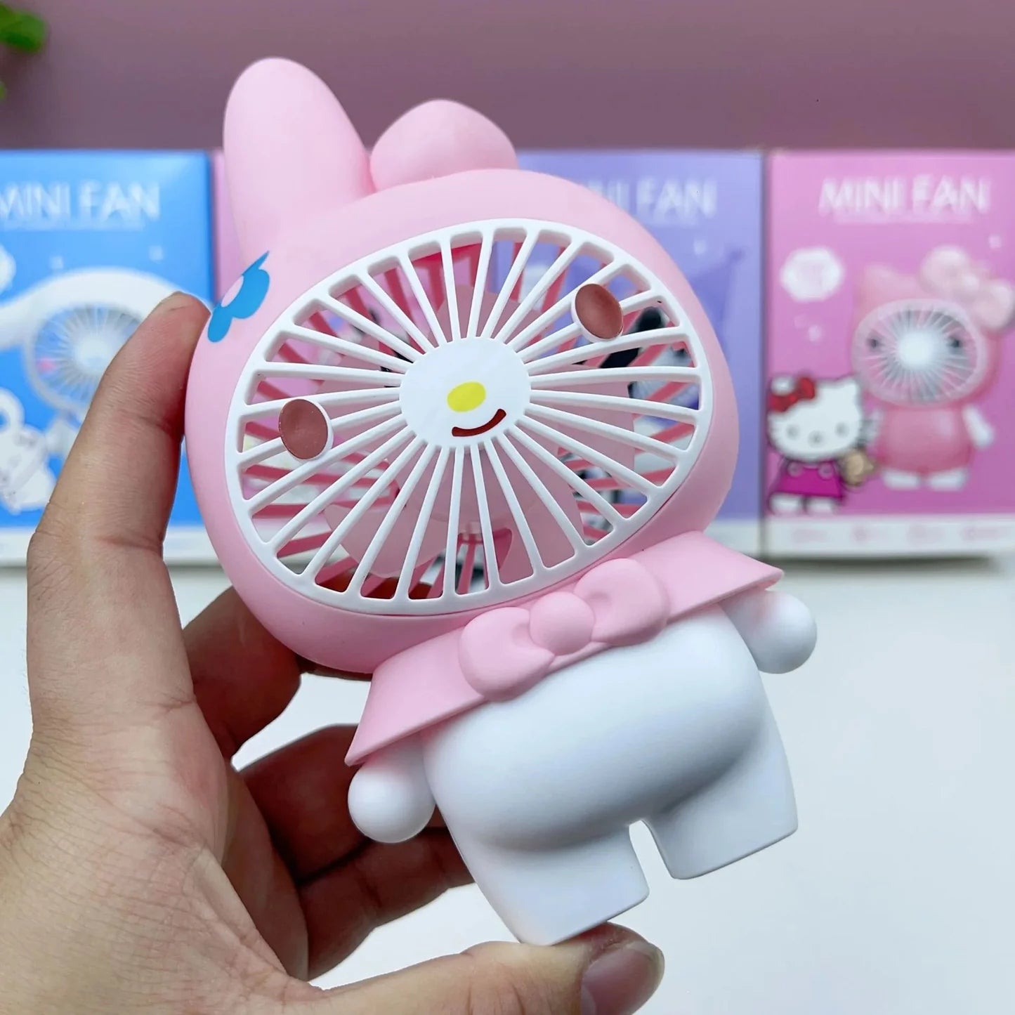Mini ventilador portátil de mano con diseños